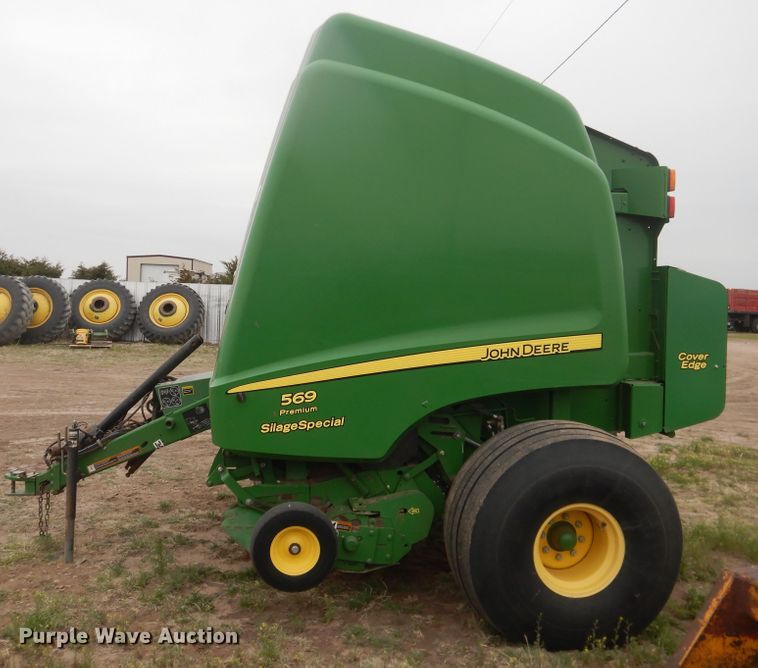 image for item IJ9308 2013 John Deere 569 Premium  round baler