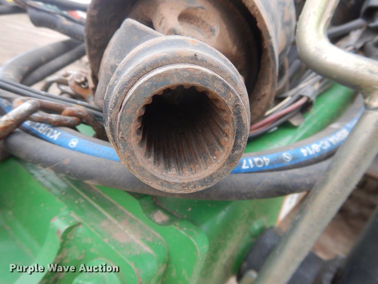 image for item IJ9308 2013 John Deere 569 Premium  round baler