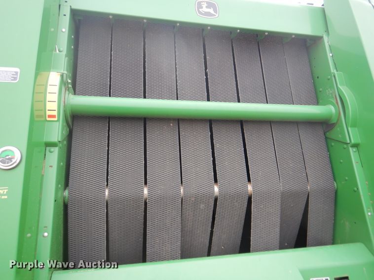 image for item IJ9308 2013 John Deere 569 Premium  round baler