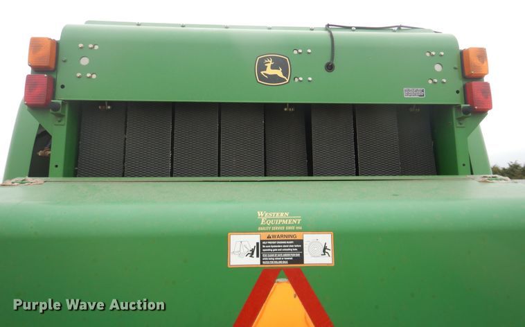 image for item IJ9308 2013 John Deere 569 Premium  round baler