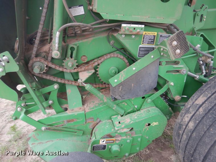 image for item IJ9308 2013 John Deere 569 Premium  round baler