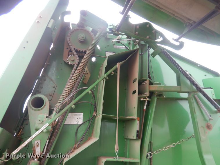 image for item IJ9308 2013 John Deere 569 Premium  round baler