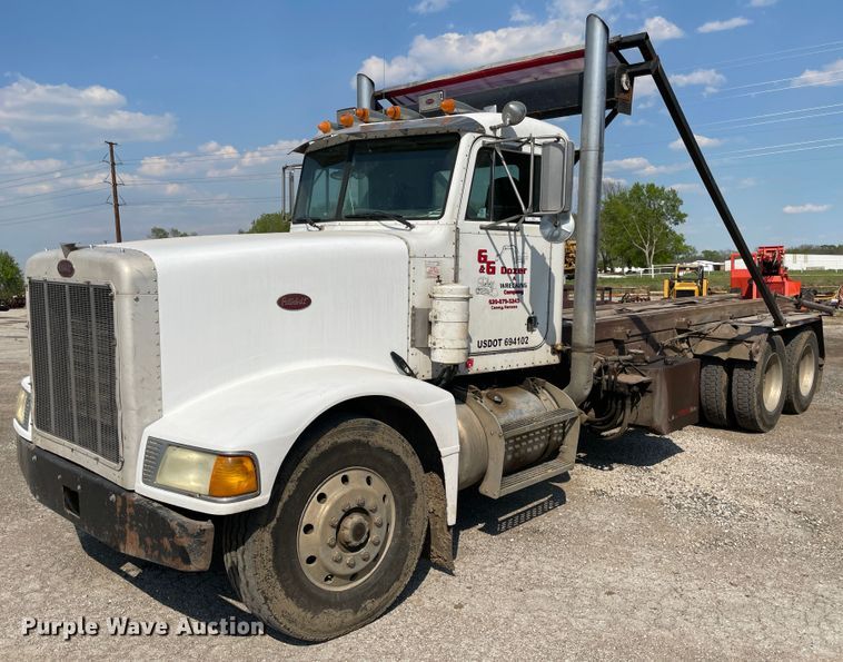 image for item IR9864 1994 Peterbilt 377  roll-off container truck