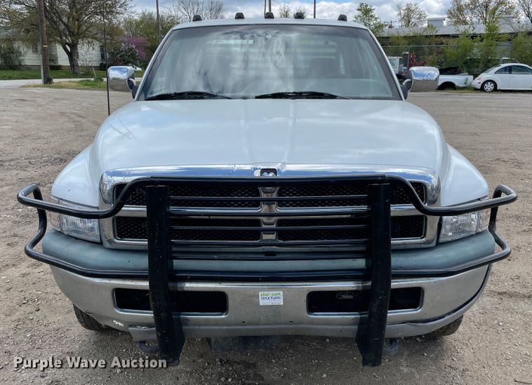image for item IR9875 1997 Dodge Ram 3500  Club Cab flatbed pickup truck