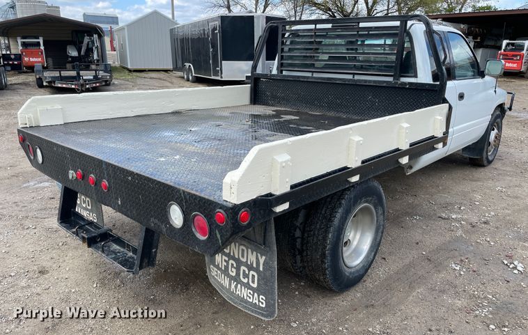 image for item IR9875 1997 Dodge Ram 3500  Club Cab flatbed pickup truck