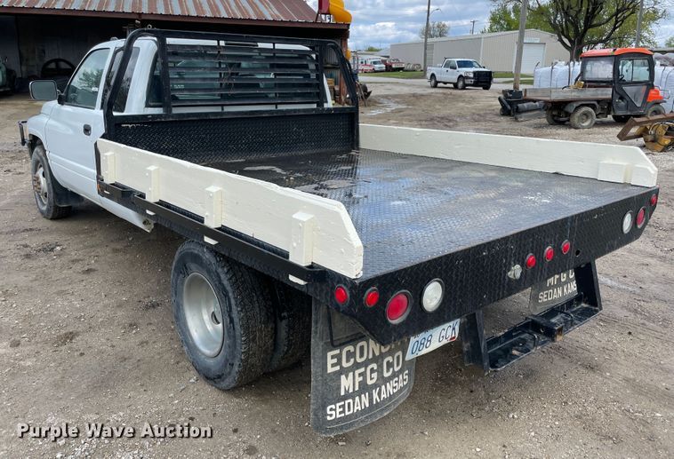 image for item IR9875 1997 Dodge Ram 3500  Club Cab flatbed pickup truck