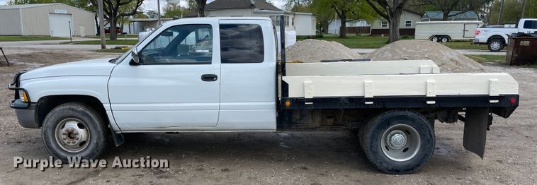 image for item IR9875 1997 Dodge Ram 3500  Club Cab flatbed pickup truck