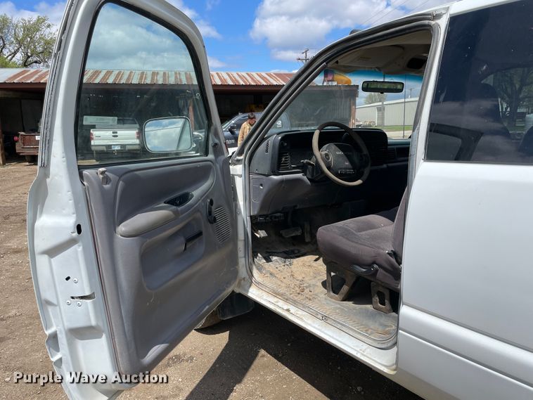 image for item IR9875 1997 Dodge Ram 3500  Club Cab flatbed pickup truck