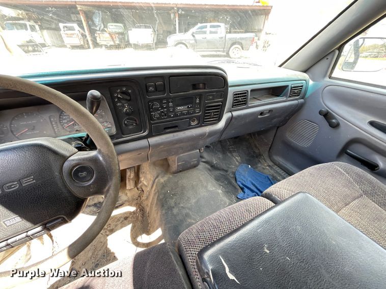 image for item IR9875 1997 Dodge Ram 3500  Club Cab flatbed pickup truck