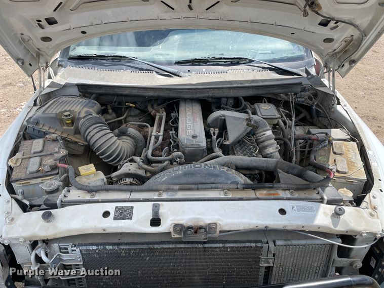 image for item IR9875 1997 Dodge Ram 3500  Club Cab flatbed pickup truck