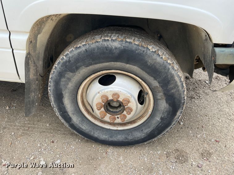 image for item IR9875 1997 Dodge Ram 3500  Club Cab flatbed pickup truck