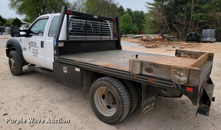 image for item IV9034 2014 Ford F450 Super Duty  SuperCab flatbed truck