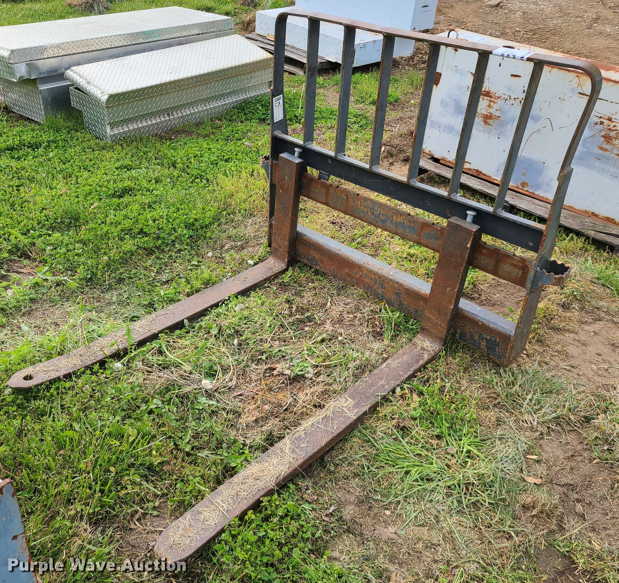 48" L skid steer forks in Raytown, MO Item DN5509 sold Purple Wave