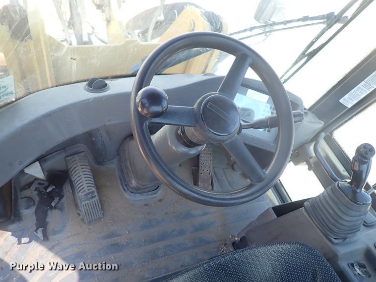 image for item DJ5651 2008 John Deere 304J  wheel loader