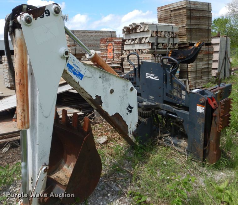 image for item IT9012 Bobcat 709FDS skid steer backhoe