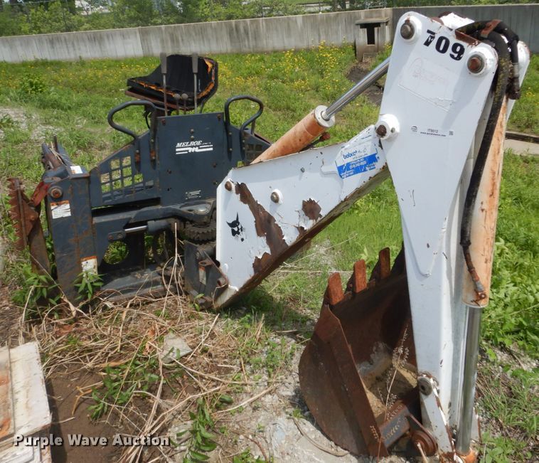 image for item IT9012 Bobcat 709FDS skid steer backhoe