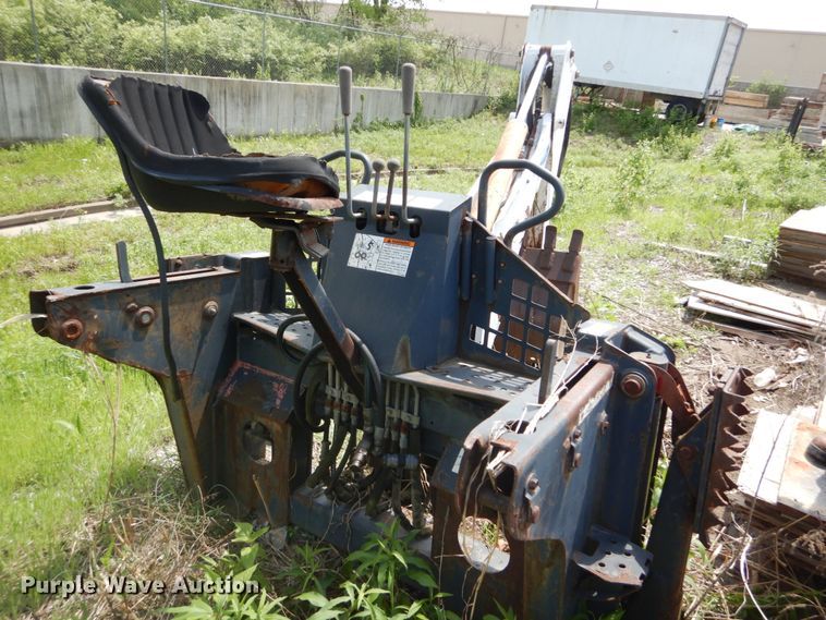 image for item IT9012 Bobcat 709FDS skid steer backhoe