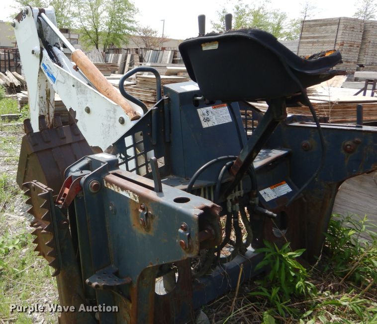 image for item IT9012 Bobcat 709FDS skid steer backhoe