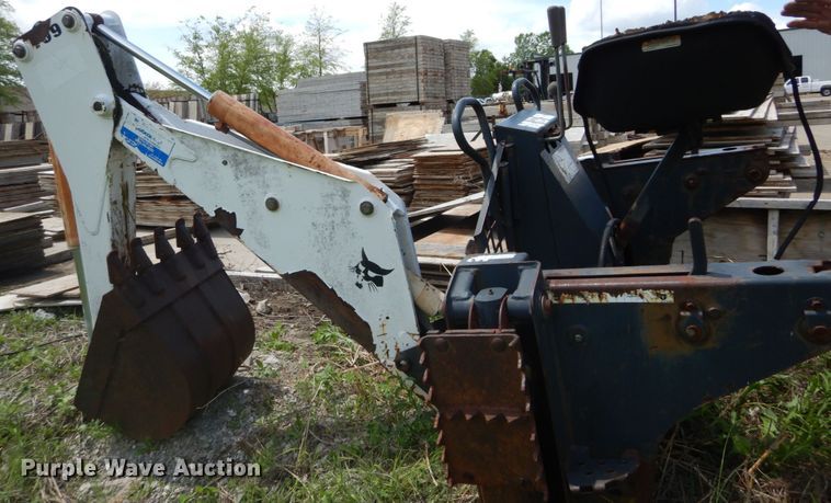image for item IT9012 Bobcat 709FDS skid steer backhoe