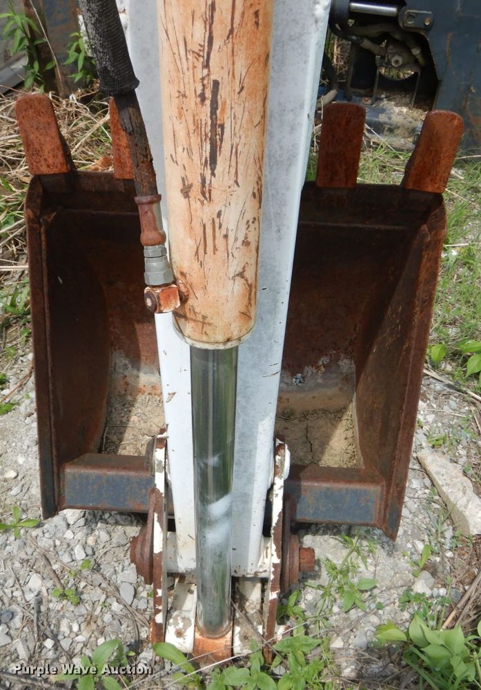 image for item IT9012 Bobcat 709FDS skid steer backhoe