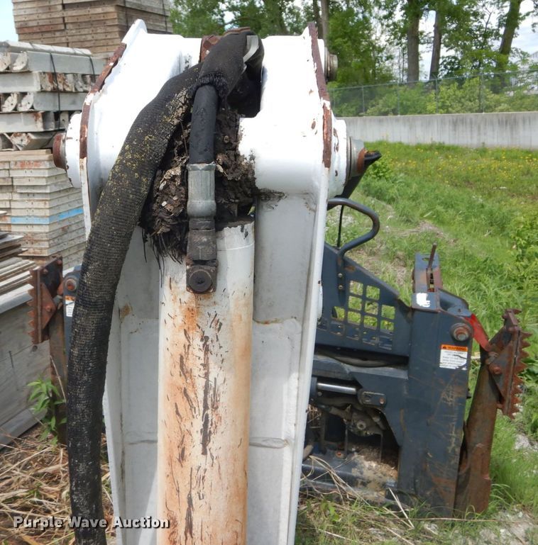 image for item IT9012 Bobcat 709FDS skid steer backhoe