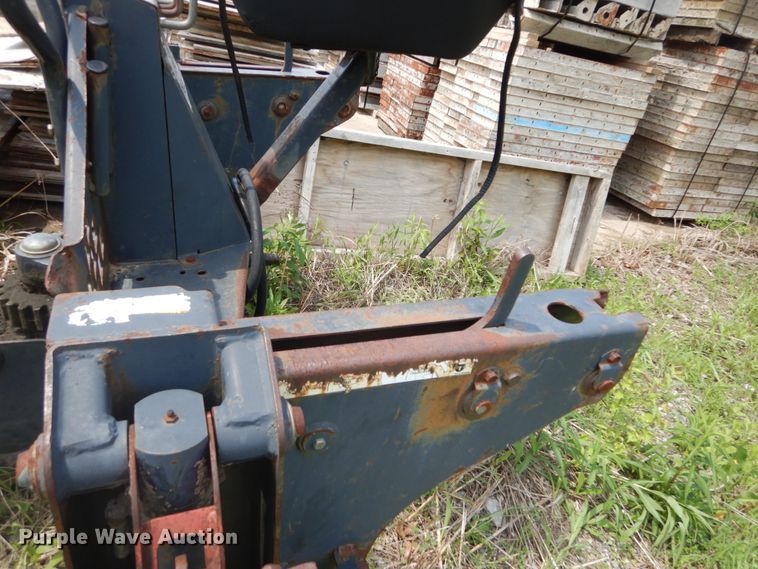 image for item IT9012 Bobcat 709FDS skid steer backhoe