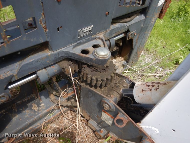 image for item IT9012 Bobcat 709FDS skid steer backhoe