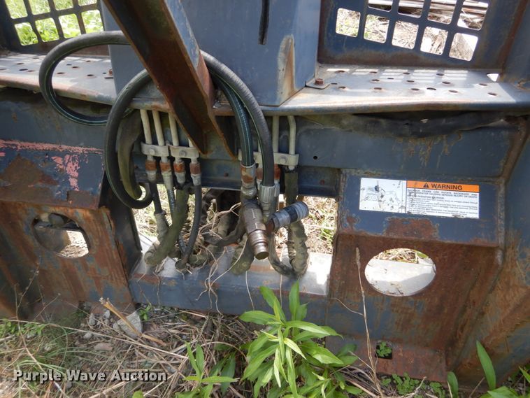 image for item IT9012 Bobcat 709FDS skid steer backhoe