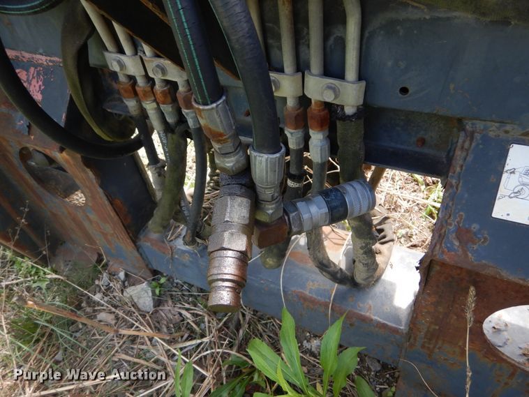 image for item IT9012 Bobcat 709FDS skid steer backhoe