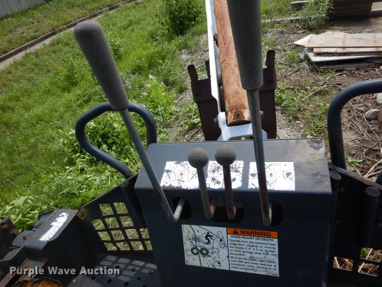 image for item IT9012 Bobcat 709FDS skid steer backhoe