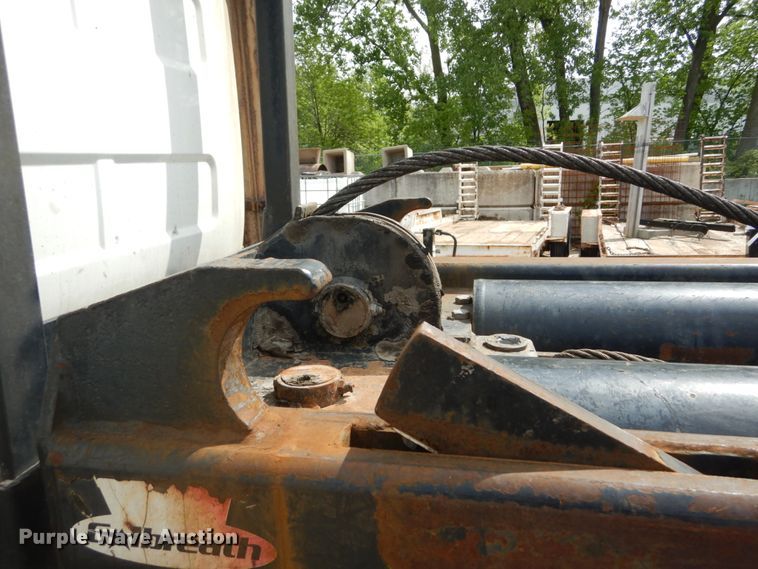 image for item IY9722 2004 Mack DM690S  roll-off container truck