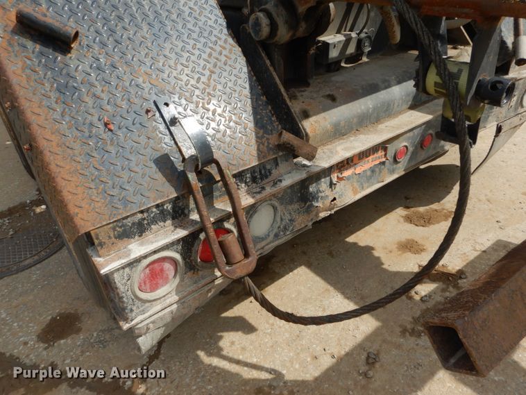 image for item IY9722 2004 Mack DM690S  roll-off container truck