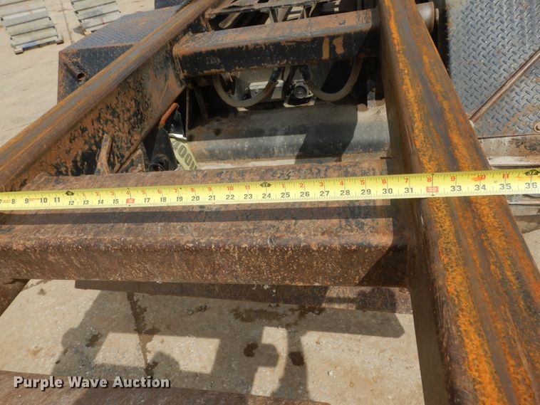 image for item IY9722 2004 Mack DM690S  roll-off container truck