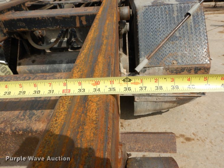 image for item IY9722 2004 Mack DM690S  roll-off container truck