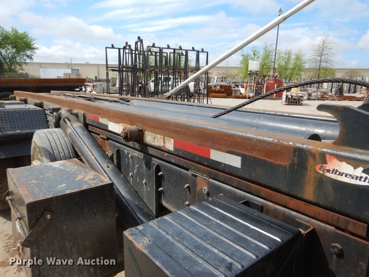 image for item IY9722 2004 Mack DM690S  roll-off container truck