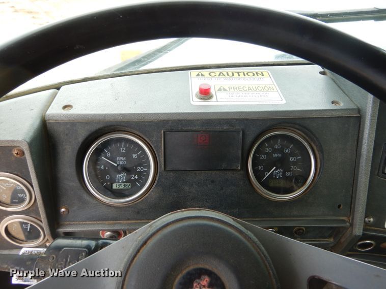 image for item IY9722 2004 Mack DM690S  roll-off container truck