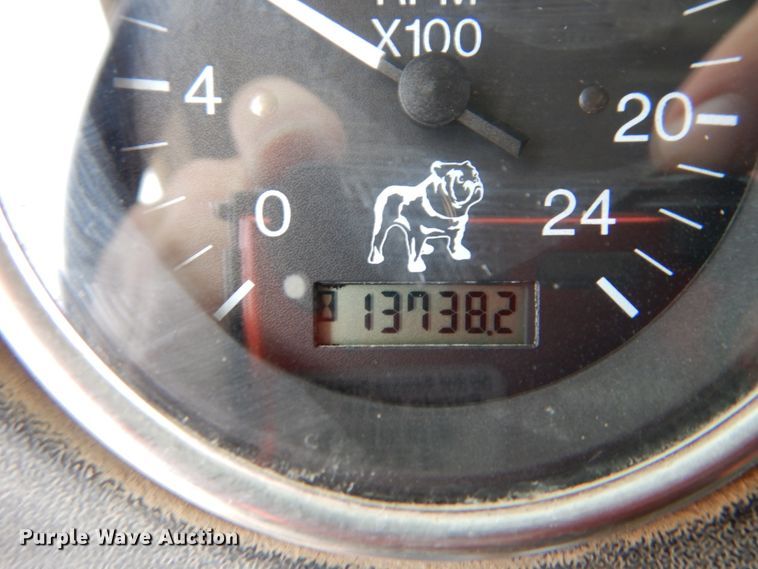 image for item IY9722 2004 Mack DM690S  roll-off container truck