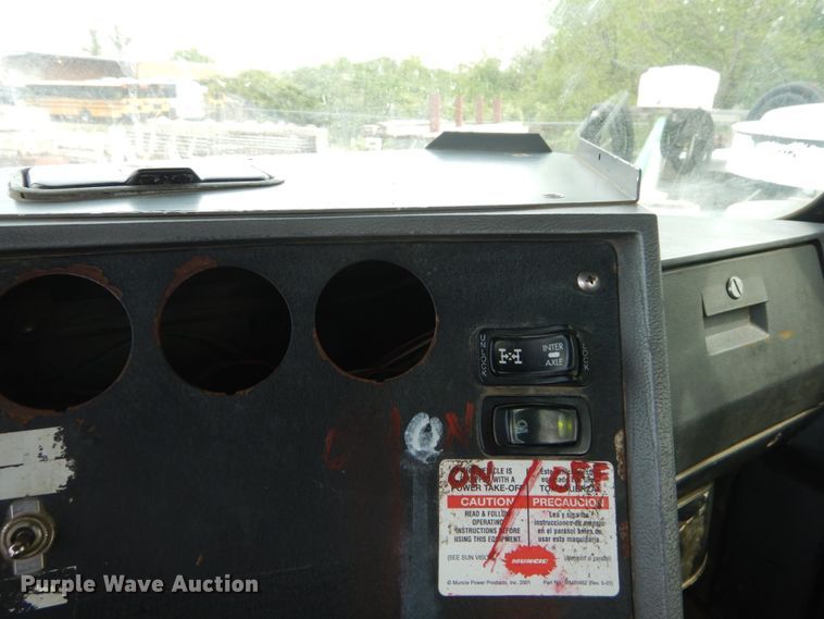 image for item IY9722 2004 Mack DM690S  roll-off container truck