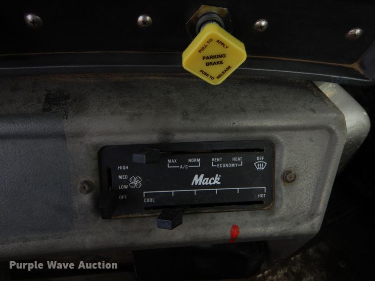 image for item IY9722 2004 Mack DM690S  roll-off container truck