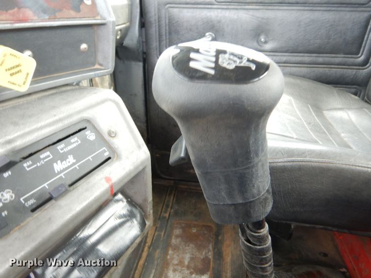 image for item IY9722 2004 Mack DM690S  roll-off container truck