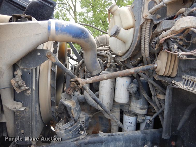 image for item IY9722 2004 Mack DM690S  roll-off container truck