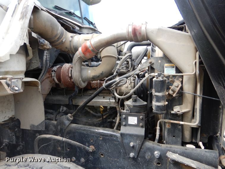 image for item IY9722 2004 Mack DM690S  roll-off container truck