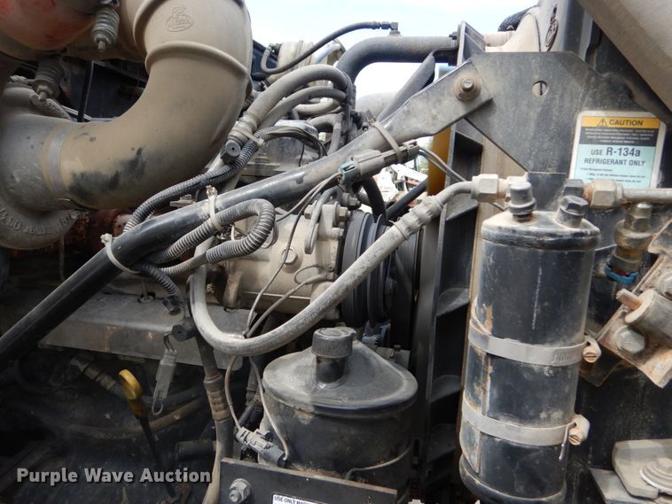 image for item IY9722 2004 Mack DM690S  roll-off container truck