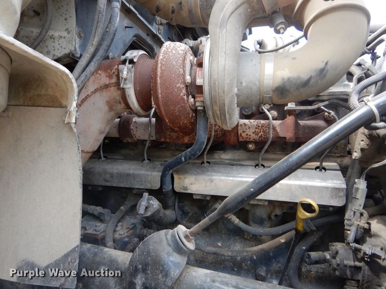 image for item IY9722 2004 Mack DM690S  roll-off container truck