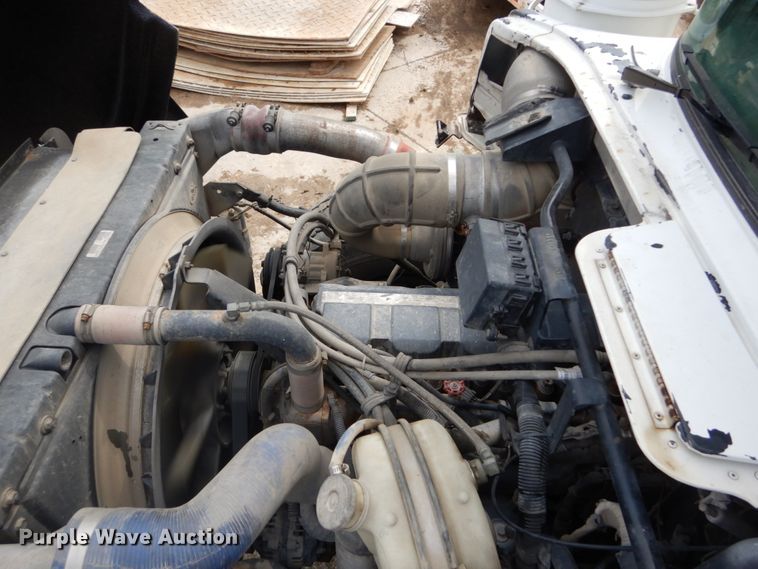 image for item IY9722 2004 Mack DM690S  roll-off container truck