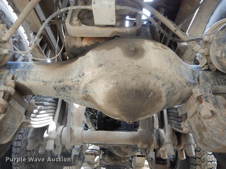 image for item IY9722 2004 Mack DM690S  roll-off container truck