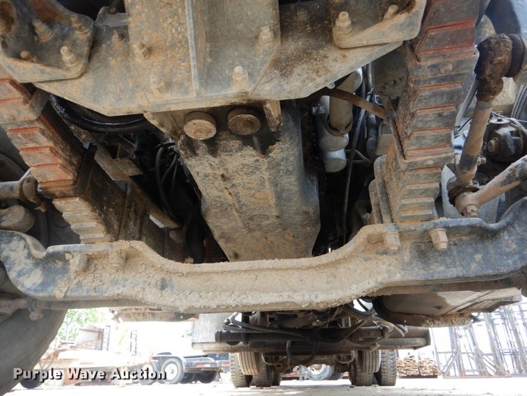 image for item IY9722 2004 Mack DM690S  roll-off container truck