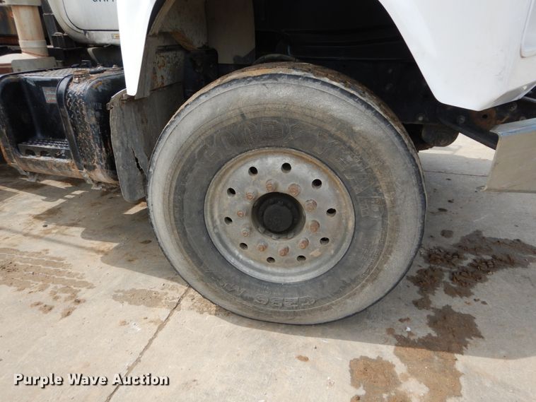 image for item IY9722 2004 Mack DM690S  roll-off container truck