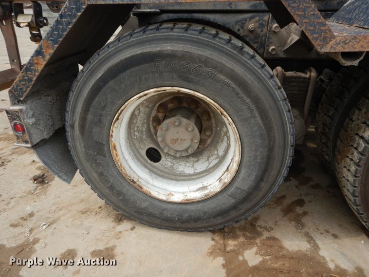 image for item IY9722 2004 Mack DM690S  roll-off container truck