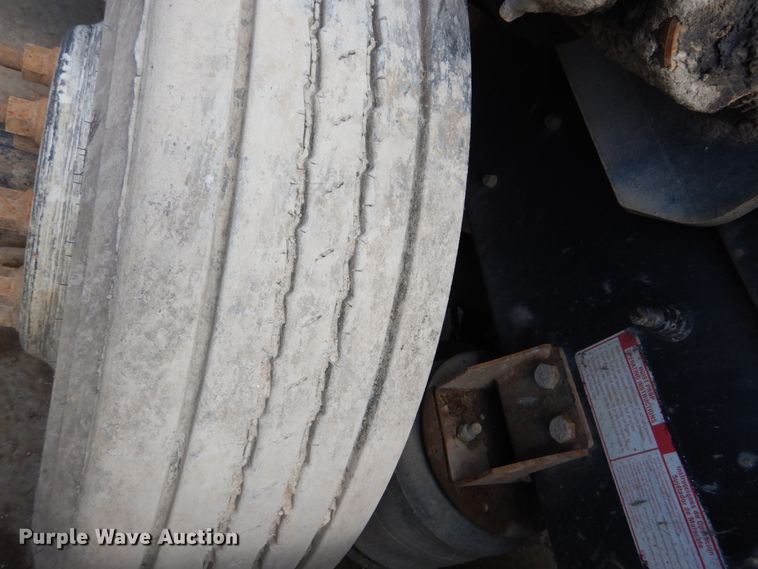 image for item IY9722 2004 Mack DM690S  roll-off container truck